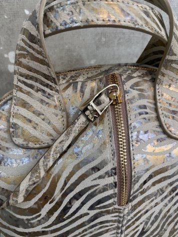 BOLSO ANIMAL PRINT ORO